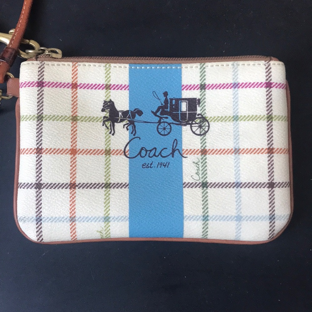 Cream pattern coach wristlet